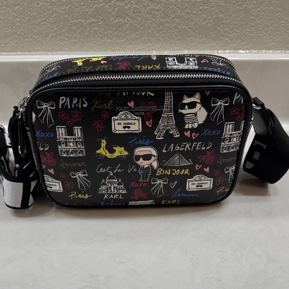 Karl Lagerfeld Handbags - Karl Lagerfeld Black Graphic Crossbody Bag with Guitar Strap. Double Zipper